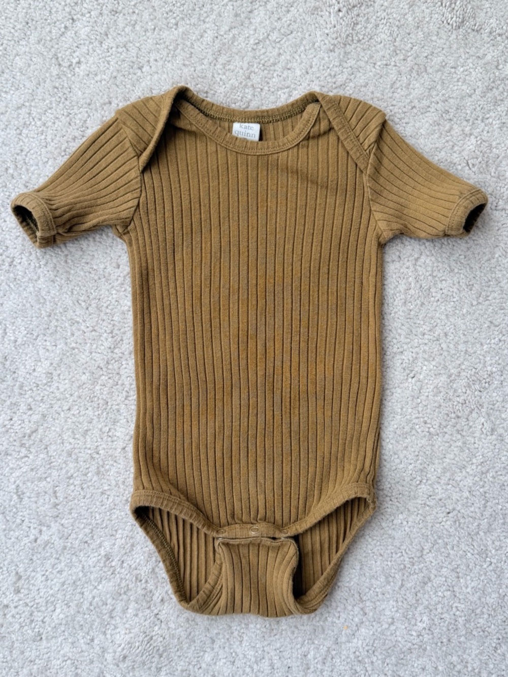 kate quinn Ribbed Short-Sleeve One-Piece Bodysuit in Brown